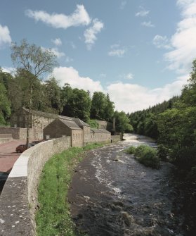 New Lanark: general view from N showing Dye Works in the context of the River Clyde