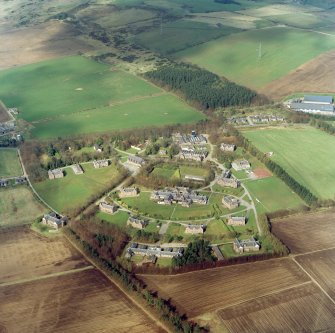 Oblique aerial view centred on the hospital, taken from the SSW.