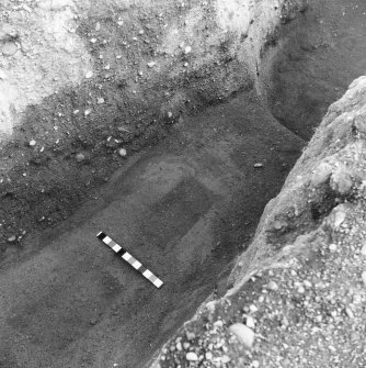 Ex-Scotland, Yeavering, Anglo-Saxon settlement - timber halls (Bede's Ad Gefrin) and Iron Age Hill fort (NGR 926 305)
Copy of view of building A2 showing impression of wall timbers section of south wall trench, excavations by Brian Hope-Taylor 1953-1962
Digital image only