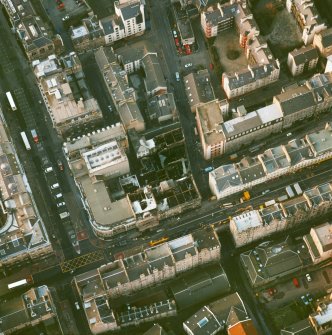 Oblique aerial view centred on the fire-damaged site at South Bridge, Edinburgh.
