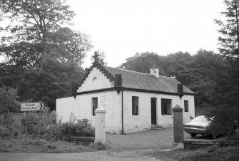 Culzean Castle, Enoch Lodge.
View of side and front of lodge with crow-stepped gable and cross.
Digital image of AY 1916.