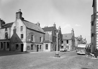 View from South of High Street, Dysart, including No.s 43 - 53 High Street (odd numbers) and 'cross' showing Anne Johnston Newsagent, Stationer and Tobacconist (no.43) and Mr Troc's' ice cream van