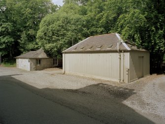View of outbuilding and electricity substation from east
