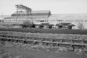 View from SE showing old bolster wagons and travelling crane in background