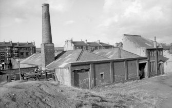 View from SW showing chimney and SSE and WSW fronts of 2 bay office and house