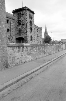 View from WSW showing WNW and SSE fronts of E wing castellated hoist block