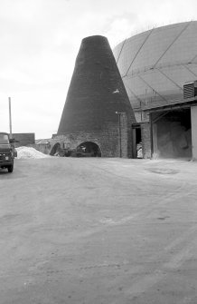 View from E showing glass cone with gasholder in background