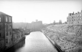 View from ENE looking down Water of Leith toward ENE front of SCWS mills, with NNW front of chemical works in left foreground