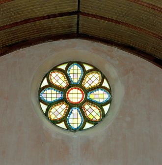 Interior, detail of stained-glass rose window