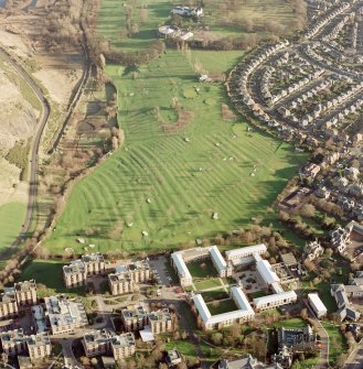 Oblique aerial view of Prestonfield centred on a golf course and rig, taken from the WNW.