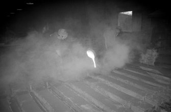 Interior
View showing men pouring rain-water pipes