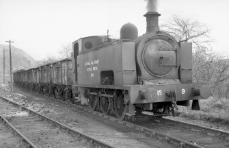 View from S showing NCB locomotive 060T no 9 departing colliery