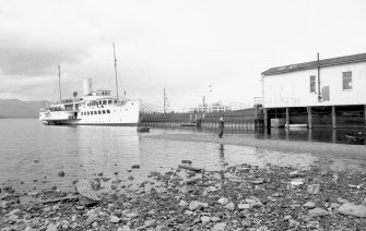 View from SSE showing Maid of the North docked at pier