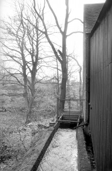 View from WNW showing waterwheel on NNE front
