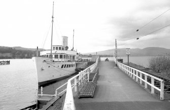 View from ESE looking down pier with Maid of the Loch docked