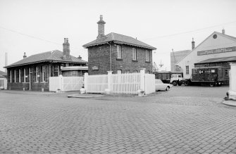 View from W showing WNW and SSW fronts of station buildings