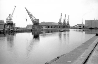 View from WSW showing cranes on N side