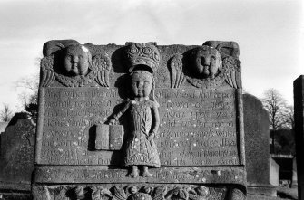 View of Webster gravestone depicting little girl with a Crown of Righteousness, 1744.