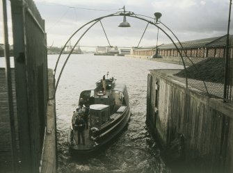 View from ESE showing ferry about to dock at terminal