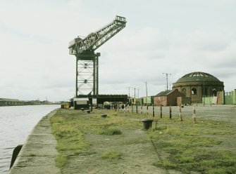 General view from ESE showing crane and N rotunda