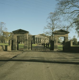 View from WSW showing WSW front of main building through gates