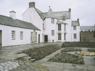 View from SSE showing ENE and SSE fronts with octagonal turret stair