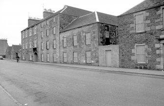 View from S showing part of Millknowe Road frontage