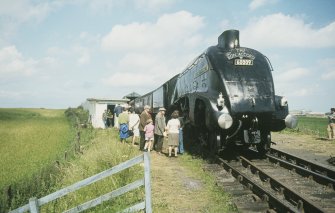 View from WSW showing Gresley Class A4 60009 'Union of South Africa' locomotive with engine shed in background