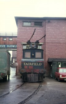 View from E showing electric locomotive at SE entrance to yard complex