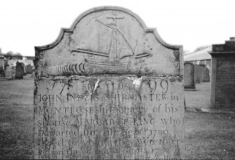 View of gravestone of John Inglis, 1799, intricate carving of a topsail gaff cutter ship.
Digital image of AN 6629.