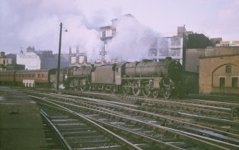 View from S showing train departing station