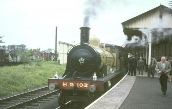 View from W showing ex-Highland Railway locomotive no 103 in station on Highland Railway Centenary Special