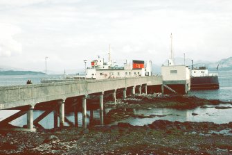 View from SW showing SSE front of pier with ferry moored on ENE front