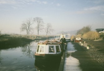 View from ESE showing restaurant barge 'Lady Margaret' at N side bridge