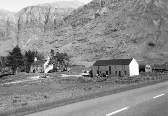 General view from north of farmhouse and bank barn
