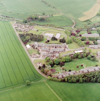 Oblique aerial view of the hospital, taken from the NNE.