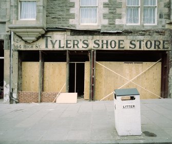 Detail of shop front for Tyler's Shoe Store exposed during renovations in May 1992