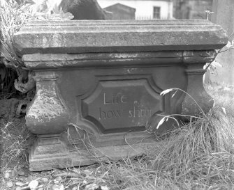 Detail of table tomb with inscription: 'Life how short' on base, St Mary's Church burial ground, Banff.