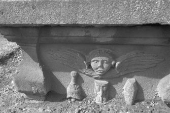 Detail of base of tomb to Skinner dated 1752. Symbols visible include winged soul above deid bell, hour-glass and upright coffin
Digital image of B 42929/24