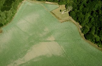 Digital image of Cambusmichael, oblique aerial view, taken from the SSW, centred on the cropmarks of the Grange. Cambusmichael Church is visible in the top half of the photograph.