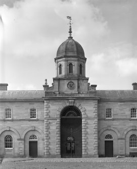 Detail of main entrance with clock stage and domed cupola.
