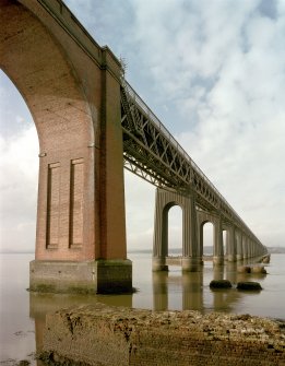 Digital image of view from SSE of south end of bridge, with foundation of old bridge pier in foreground
