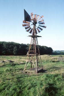 General view of a 'Dickie' windpump working at North Highcraig Farm, Eaglesham, Renfrewshire, in August 1981.
Copy of 35 mm colour transparency.