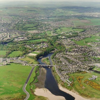 General oblique aerial view up the River Don from the Bridge of Don, taken from the E.