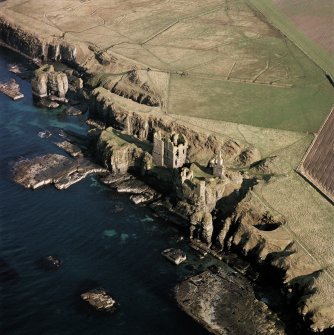 Obliage aerial photograph showing castles Girnigoe and Sinclair, and Castle Haven Dyke.