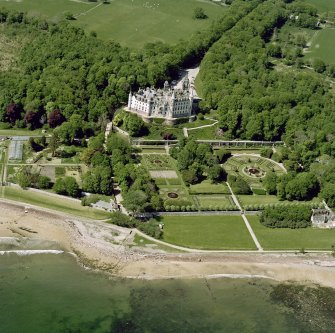 Oblique aerial view of Dunrobin Castle, walled garden and formal gardens, taken from the E.