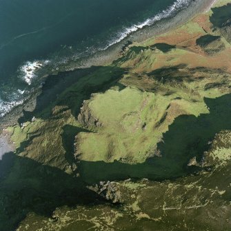 Oblique aerial view centred on the remains of the fort, taken from the SW.