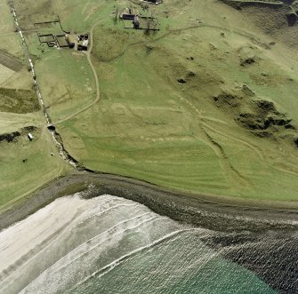 Oblique aerial view centred on Laig square cairn cemetery from N