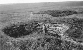 Scanned image of E 49350 - a photograph of a broch site.
