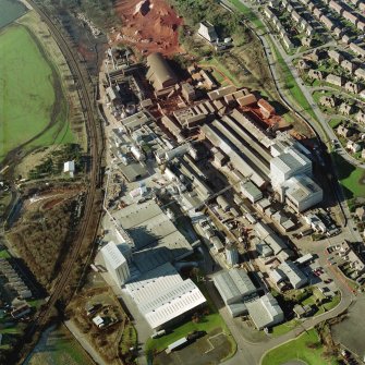 Oblique aerial view centred on the Alumina Works, taken from the ESE.